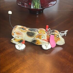 Fisher-Price Snoopy Dog Pull Toy with Red and Black Accents